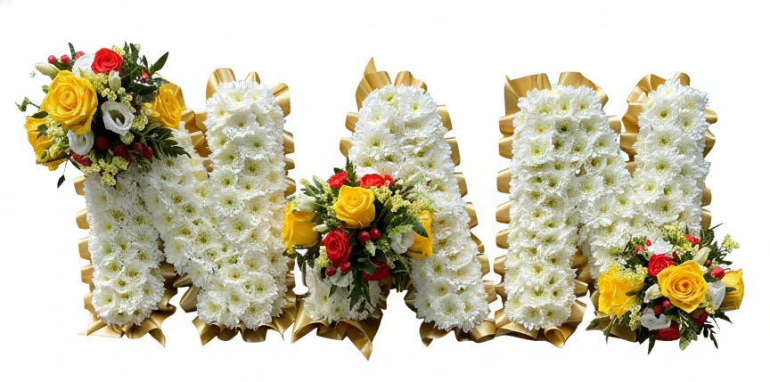 Floral arrangements on a wooden bench with a grassy background