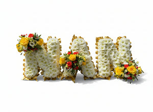 Floral arrangement spelling out 'NIM' on a white background