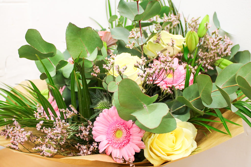 The Sophia bouquet with pink and white roses and gerberas, hand-tied with eucalyptus – Wildest Dreams Flowers UK