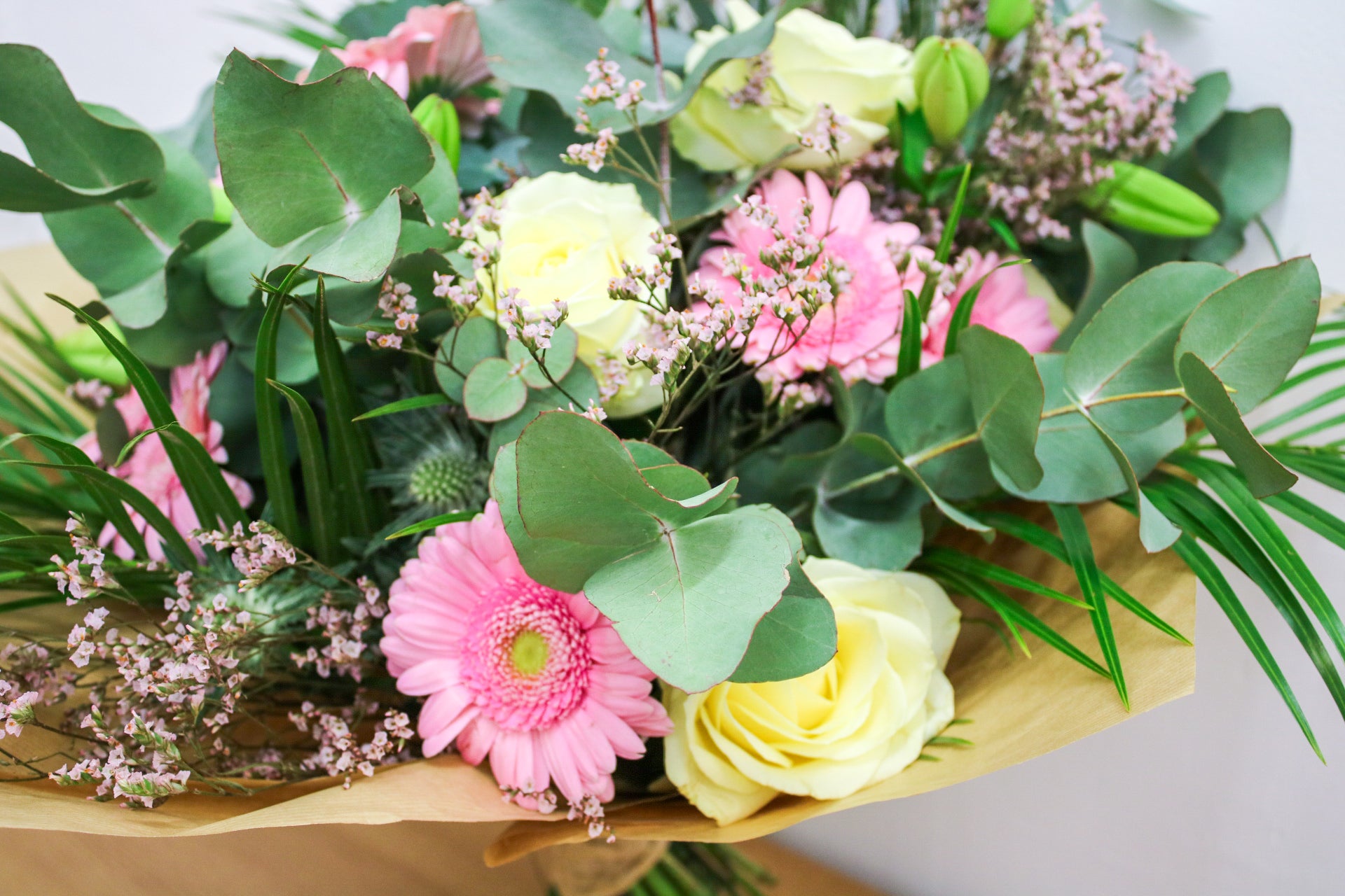 Soft, romantic setting with The Sophia bouquet of pink roses and eucalyptus – dreamy floral gift for her