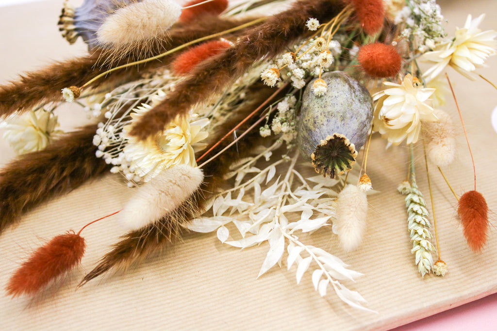 Oversized dried pampas floral arrangement with soft beige pampas grass and lush dried foliage, perfect for a boho wedding or rustic home decor