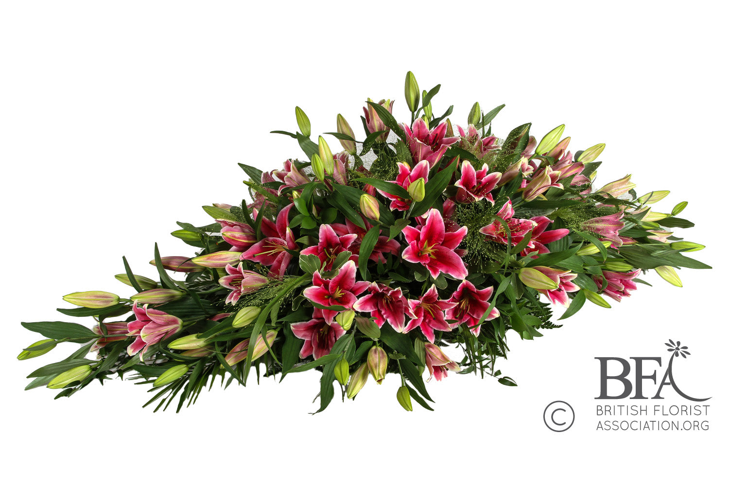 Elegant pink oriental lily spray, with soft petals and delicate foliage, perfect for honoring a loved one.