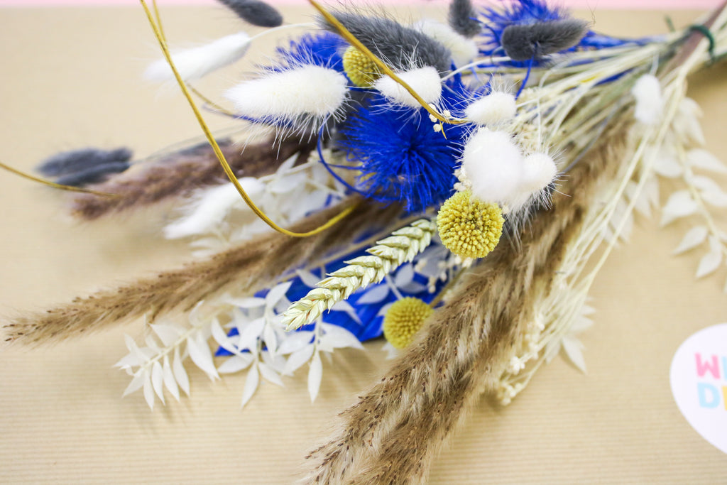 Beautiful yellow and blue pampas bouquet with an assortment of dried flowers, ideal for adding rustic charm to weddings, events, or as a stylish home arrangement.