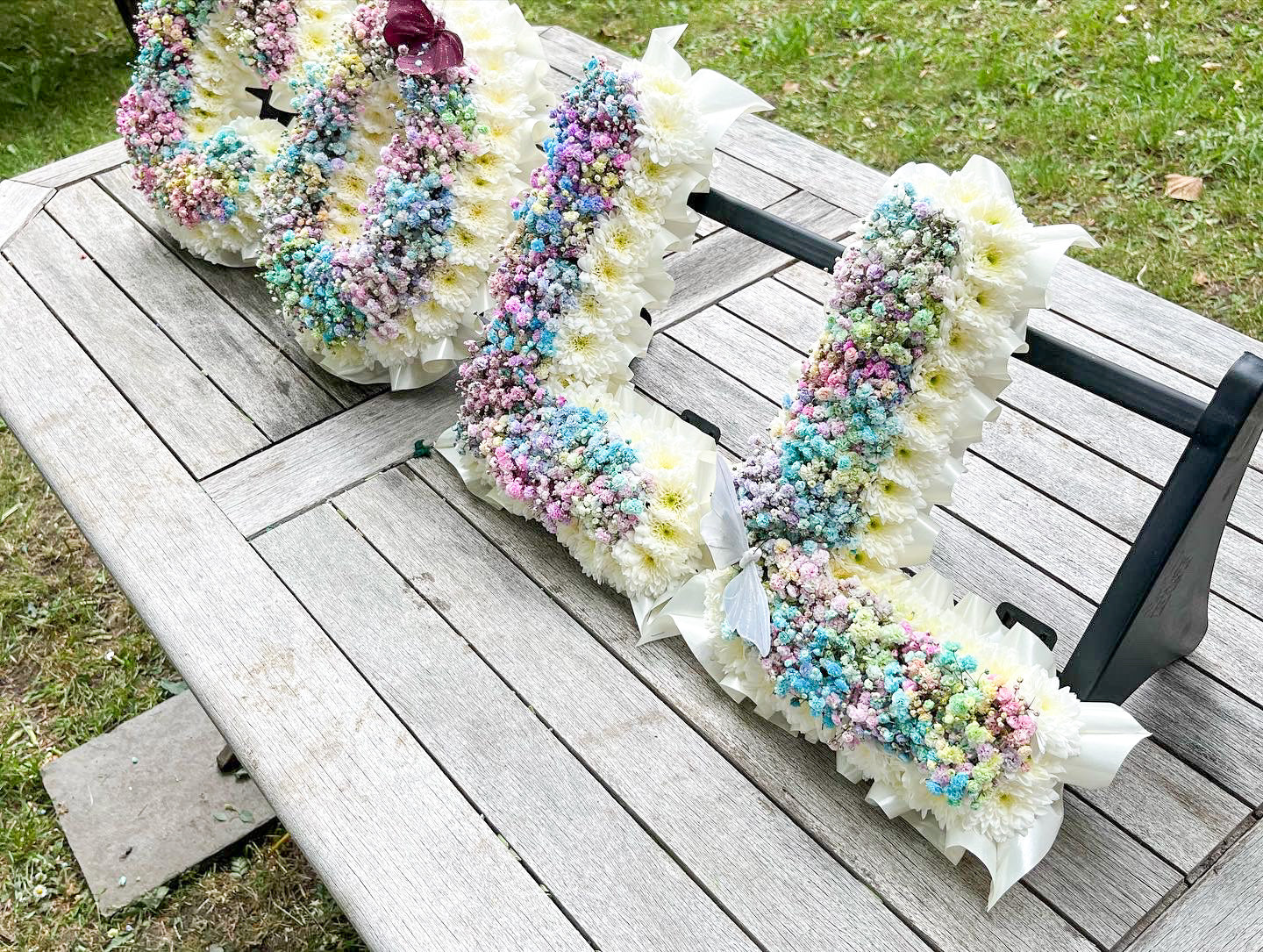 Rainbow Gypsophila Letter Tribute – Vibrant Personalized Funeral Floral Arrangement - Magic and Stars -funeral Flowers-Wildest Dreams Flowers